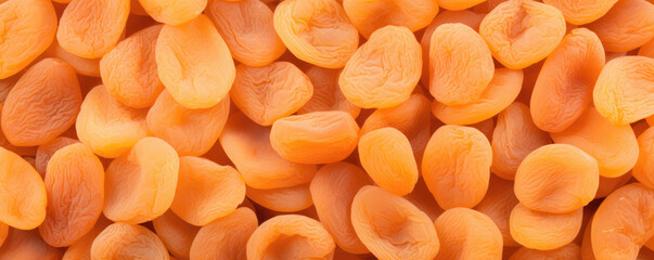 Top view of yellow dried apricots for background. Beautiful background for design.