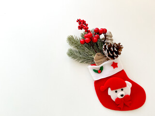 Christmas composition. Gifts, fir branches, holiday decorations on a white background. Christmas, winter, new year concept. Flat image, top view, copy space