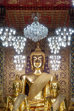 Lamphun Province Thailand:12, 06 , 2023. Beautiful magnificent golden principle Buddha image in the temple of Wat Phra That Haripunchai of Lamphun Province.