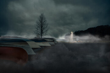 Misty dock under the cover of the night with boats and sharp lamp light