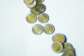 indonesia 1000 rupiah coins on a white background