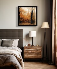 Serene bedroom setting with a stunning autumn forest artwork creating a calm and peaceful vibe