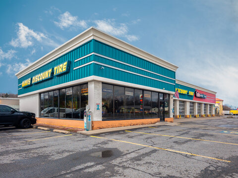 New York Mills, NY - Nov 23, 2023: Mavis Discount Tire is a well-known tire retailer in the US, offers a wide selection of tires with over 1000 location in the US Northeastern and Mid-Atlantic regions