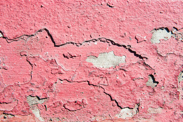 Peeling paint on a concrete wall