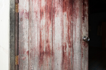 wooden door with silver door knob..