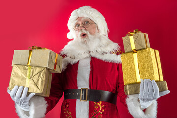 Emotional senior male model old man with a natural white beard in the role of Father Christmas