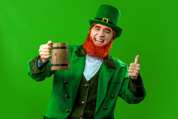 Leprechaun elf on St. Patrick's Day. Cheerful character Irish leprechaun for advertising with a red...