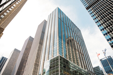 Fototapeta na wymiar Exterior of multistoried skyscrapers with glass walls