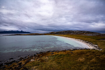 Mjelle beach during winter with clouds in norway