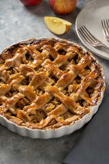 Whole apple pie, homemade fresh fruit pie with red apples, top view