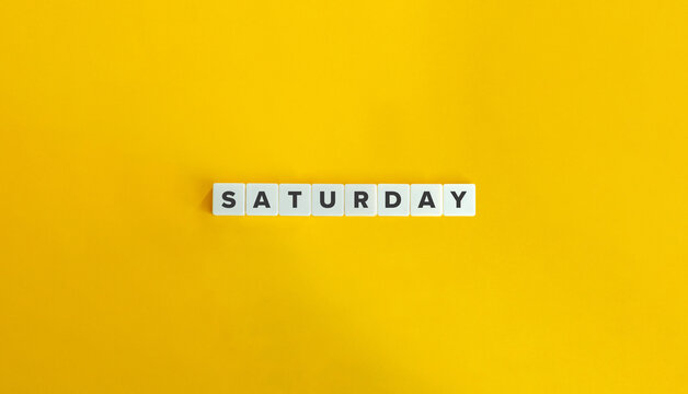 Saturday Word on Block Letter Tiles on Yellow Background. Minimalist Aesthetics.