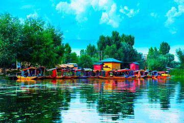  Dal Lake and the beautiful mountain range in the background, in the summer Boat Trip, of city Srinagar Kashmir India.