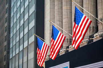 American flags on city building