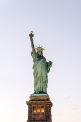 Fototapeta premium Statue of Liberty against gray sky