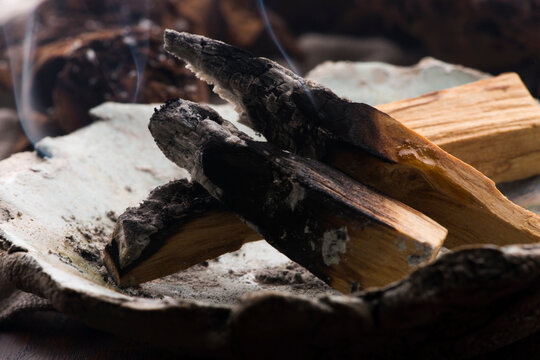 Smudging ceremony using Peruvian Palo Santo holy wood incense stick