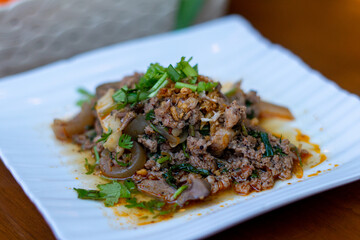 Northern Thai food, spicy minced pork salad (Larb Moo Kua)