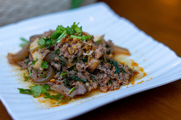 Northern Thai food, spicy minced pork salad (Larb Moo Kua)