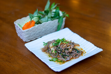 Northern Thai food, spicy minced pork salad (Larb Moo Kua)