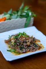 Northern Thai food, spicy minced pork salad (Larb Moo Kua)