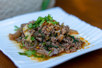 Northern Thai food, spicy minced pork salad (Larb Moo Kua)