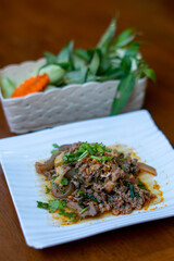 Northern Thai food, spicy minced pork salad (Larb Moo Kua)