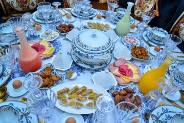 Traditional Moroccan breakfast with pancakes,eggs,olives,olive oil