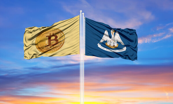 Bitcoin and Louisiana two flags on flagpoles and blue sky.