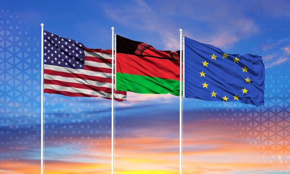 Three realistic flags of European Union, United States and Malawi on flagpoles and blue sky.