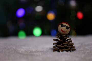 Pine cone toy on Christmas background
