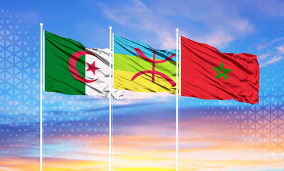 flags of morocco, algeria and Berber on flagpoles and blue sky.
