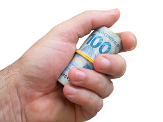 Hand holding one hundred reais notes. Brazilian money