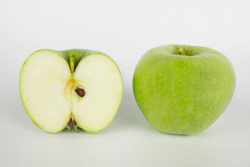 Green apples and half of apple Isolated