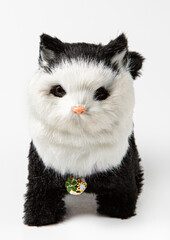 Children's toy cat on a white background.