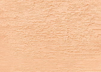 Wall texture with decorative peach plaster