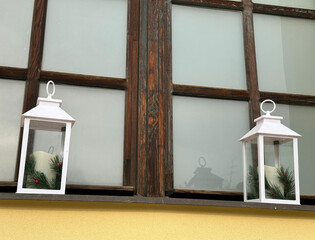 Lanterns in the church window before christmas