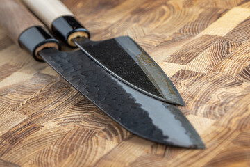 Japanese premium knives released.Damascus steel pattern.Background with a pattern of Damascus steel. - obrazy, fototapety, plakaty