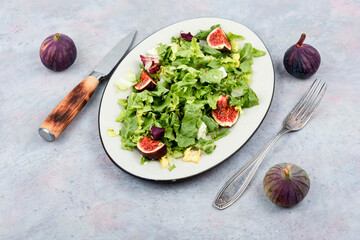 Homemade fruit salad bowl with figs.