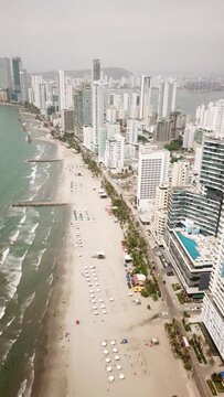 Bocagrande, Cartagena. Colombia. Drone Shot of Modern Waterfront Buildings and Hotels on Caribbean Sea. High quality 4k footage. Aerial shot of the beautiful Cartagena city and playa De Bocagrande.