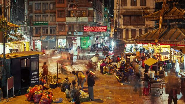 Time lapse of busy street life in Asan Bazar, Kathmandu, Nepal at night