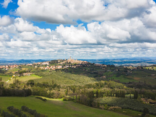 Fototapeta na wymiar Aerial view of tuscany landscape with San Gimignano in the background. Siena, Tuscany, Italy.