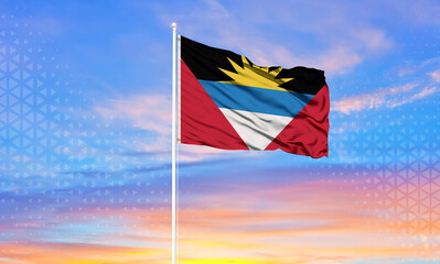 Antigua and Barbuda national flag waving in beautiful clouds..