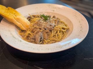 truffle pasta in ceramic plate