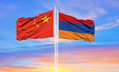 Flag of China and Armenia waving in the wind against white cloudy blue sky together. Diplomacy concept, international relations