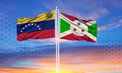 Venezuela and Burundi two flags on flagpoles and blue cloudy sky . Diplomacy concept, international relations