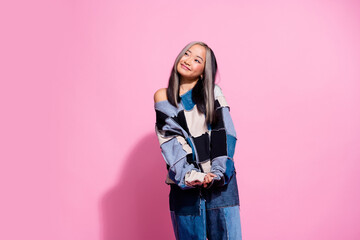 Naklejka premium Photo of creative minded nice girl look empty space fantasize imagine isolated on pink color background