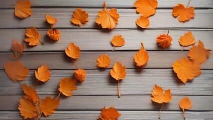orange leaves placed on the table background 