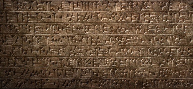 Ancient cuneiform Sumerian text. Historical background on the theme of civilizations of Assyria, Mesopotamia, Babylon, interfluve, Sumerian. Ancient archaeological background.