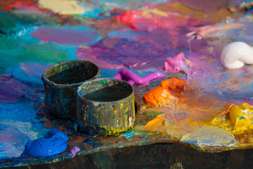 Colorful palette with vibrant oil paints