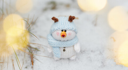 toy snowman in a snow