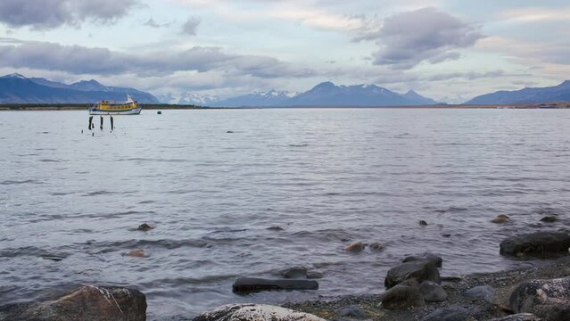 Moving morning time lapse of &Uacute;ltima Esperanza Sound in Puerto Natales, Patagonia, Chile at dusk